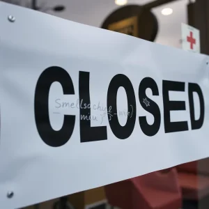 Closed sign on Sunshine Health Market in Shreveport